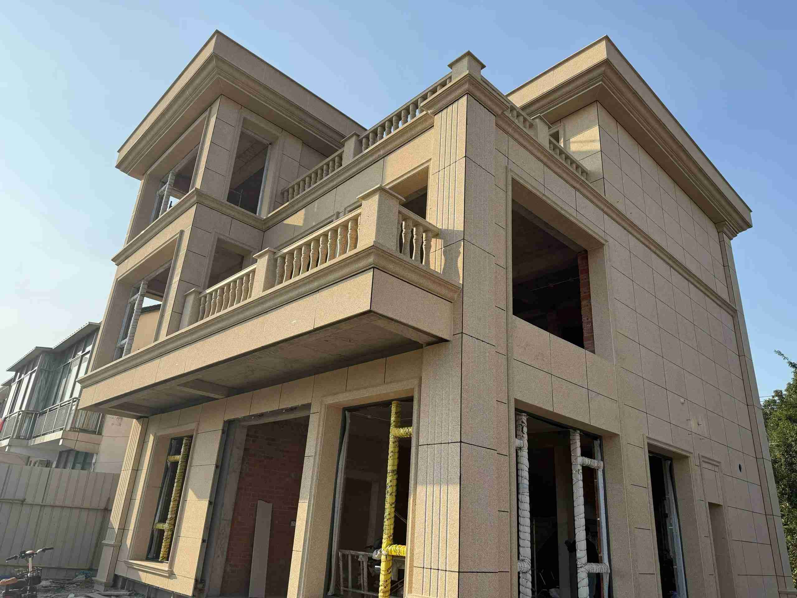 保定 黄金麻花岗岩石材荔枝面外墙干挂效果展示